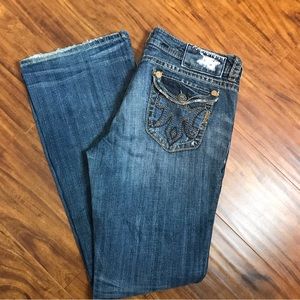 Mek  medium wash distressed bootcut Seville jean size 32x34